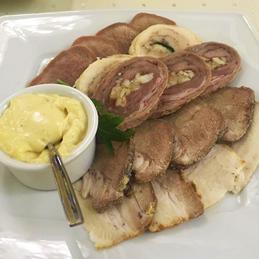 Assorted meat: chicken roll, veal roll, baked shponder, beef tongue, pork and sauce Aleoli