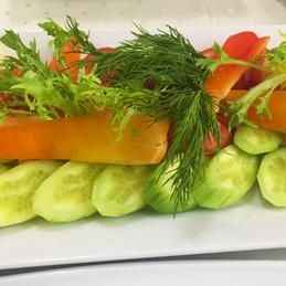Vegetable bouquet: cucumber, tomato, pepper, onion, mixed salad